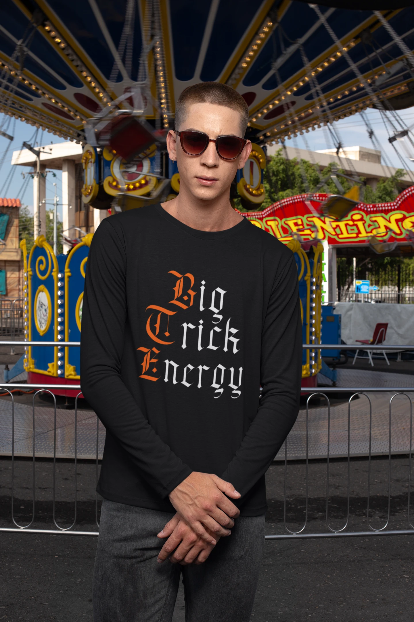 882-long-sleeve-t-shirt-mockup-of-a-man-standing-in-front-of-a-swing-carousel-ride-2-17732754699942.png