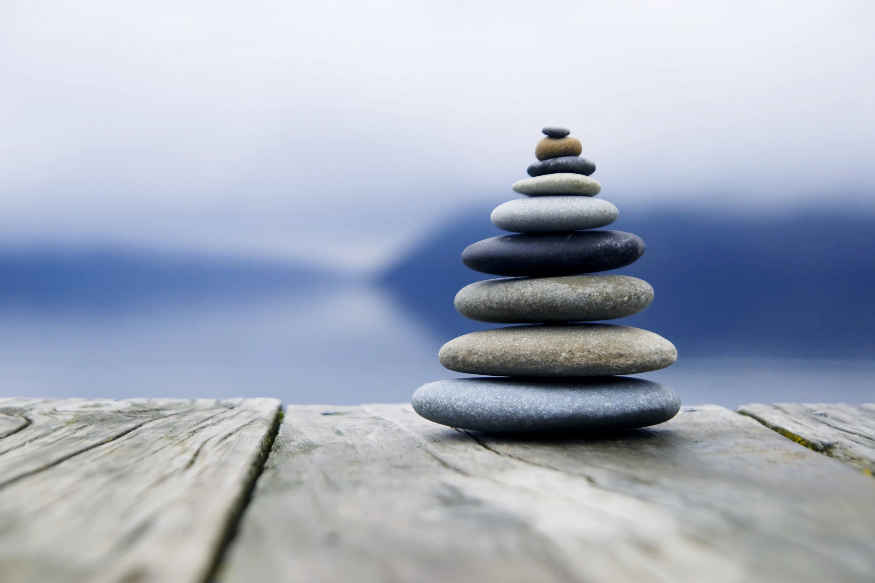 r1029-zen-balancing-pebbles-misty-lake-17602840828356.jpg